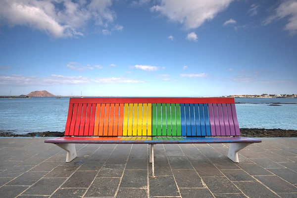 DSCF0019 
 'Rainbow Bench' on the promenade at Corralejo, Fuerteventura, Canary Islands 
 Keywords: Fuerteventura, Corralejo, Canaries, Canary Islands, Rainbow, Bench