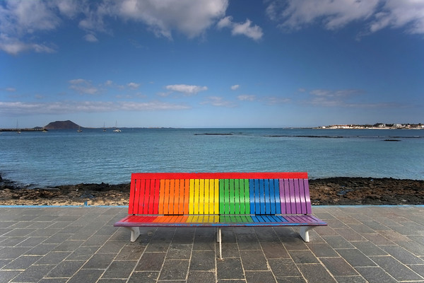 DSCF0015 
 'Rainbow Bench' on the promenade at Corralejo, Fuerteventura, Canary Islands 
 Keywords: Fuerteventura, Corralejo, Canaries, Canary Islands, Rainbow, Bench